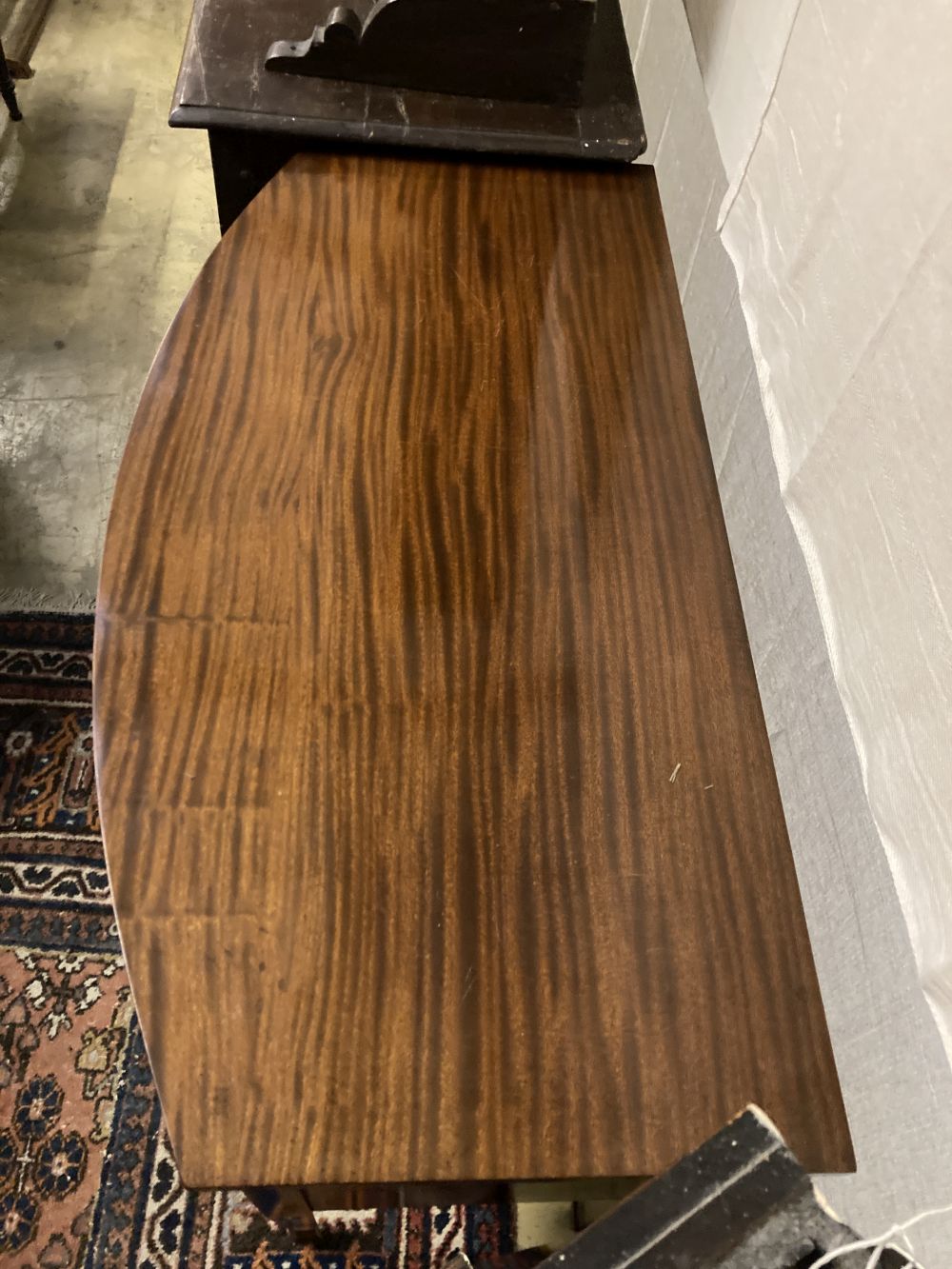 A George III style mahogany bow fronted sideboard, width 106cm, depth 53cm, height 84cm